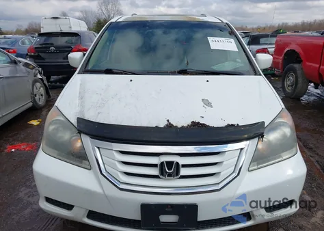 2010 Honda Odyssey Ex-L z USA, uszkodzony, nr VIN 5FNRL3H63AB103585